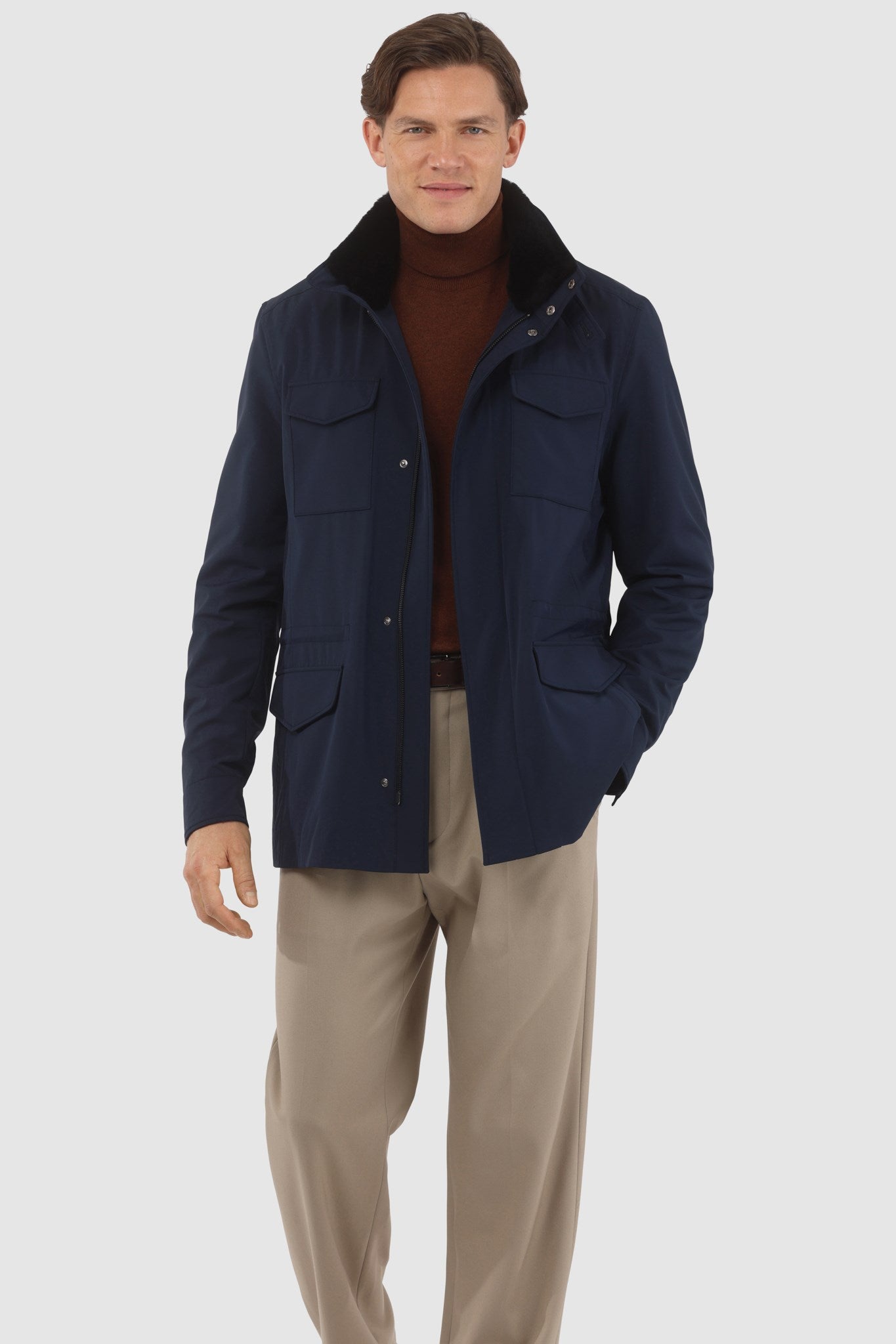 Veste pour homme confectionnée en tissu Loro Piana Storm System avec col amovible en peau lainée et capuche dissimulée
