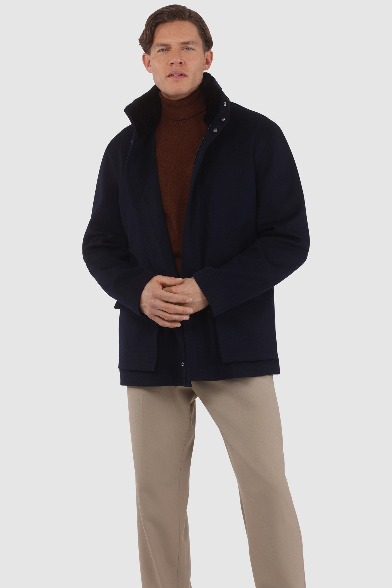 Veste pour homme confectionnée en laine Loro Piana avec col amovible en peau lainée d'agneau sélectionnée